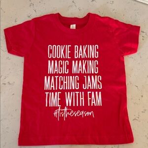 Small Shop Red Graphic Tee with Festive Text